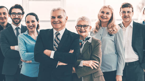 istock large group of diverse business people looking up. 1464667307