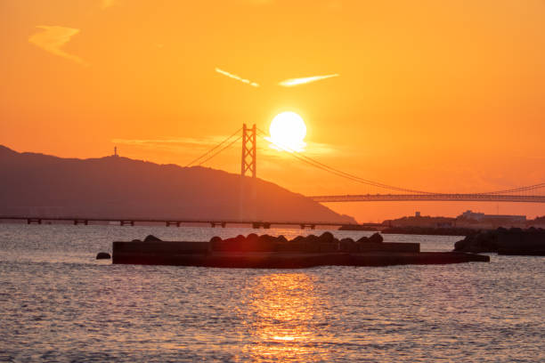 sunset-szene - kobe bridge japan suspension bridge stock-fotos und bilder
