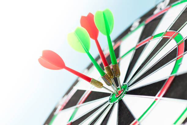 dart board and arrow on white background