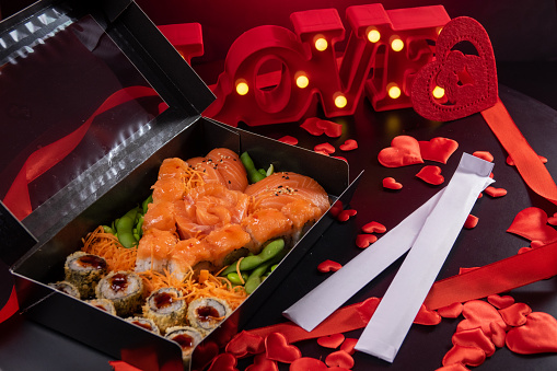 Valentine's day sushi with sushi box, written love and hearts