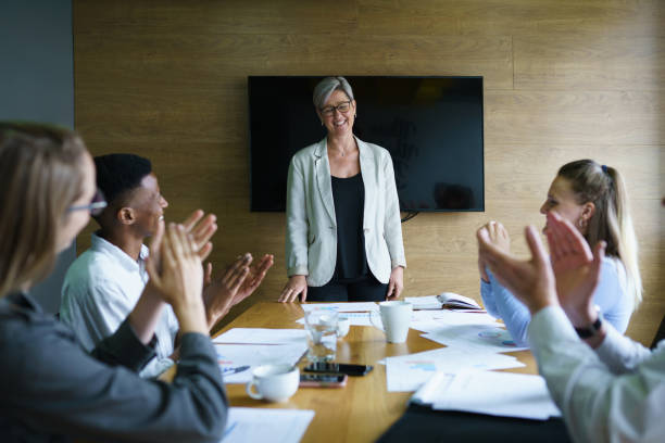 istock Team of professionals celebrating success 1464676890