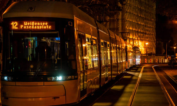 istock Train In Illuminated Railroad Station At Night 1464679530