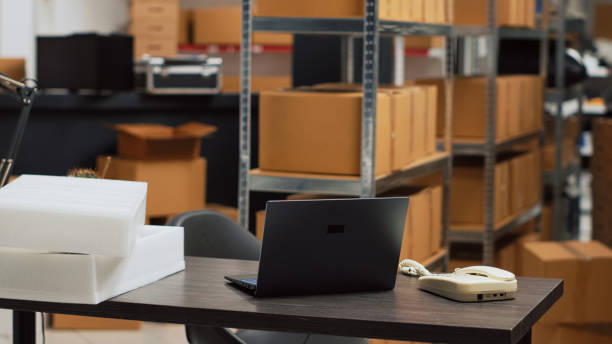 istock Empty warehouse depot with logistics desk and racks 1464683958