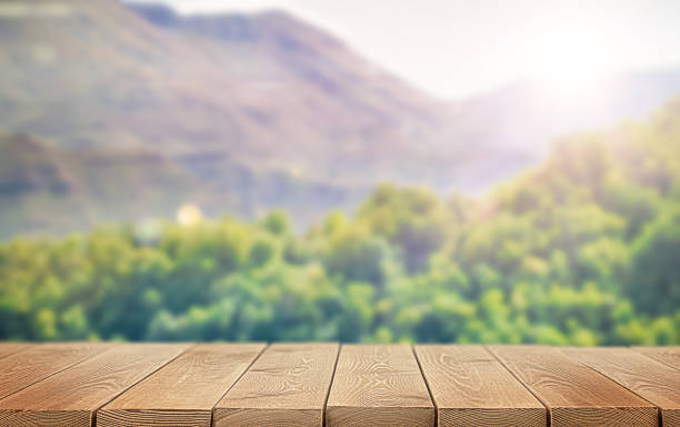 wooden empty table on nature background wooden empty table and natural defocused background picnic table stock pictures, royalty-free photos & images