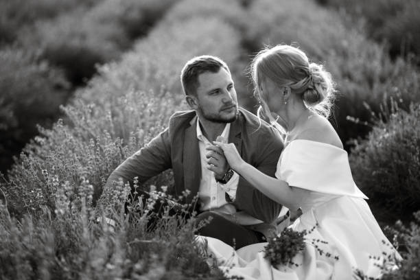 istock bride and groom on in the lavender field 1464685293