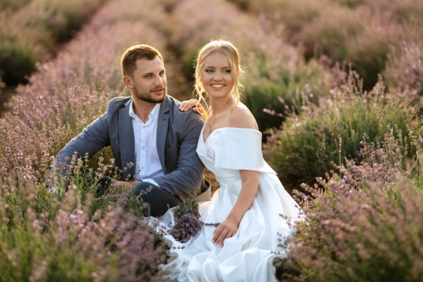 istock bride and groom on in the lavender field 1464685325