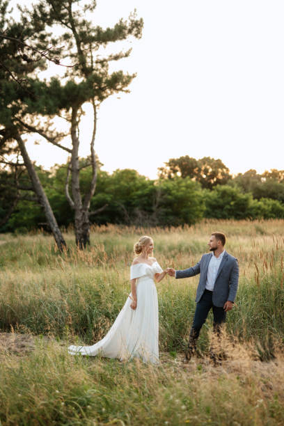 istock bride and groom on in the woods 1464685610