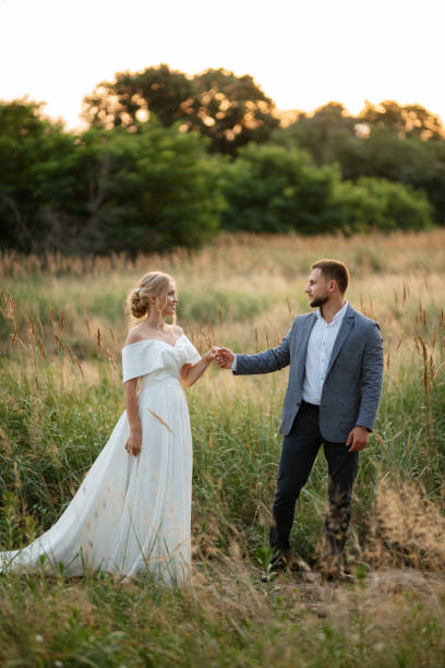 istock bride and groom on in the woods 1464685888