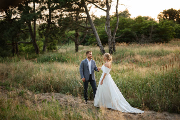 istock bride and groom on in the woods 1464685933