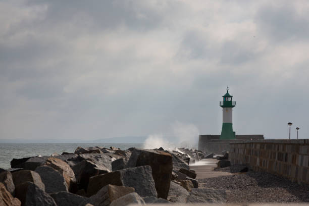 istock The surf hits the pier light of Sassnitz. 1464685967