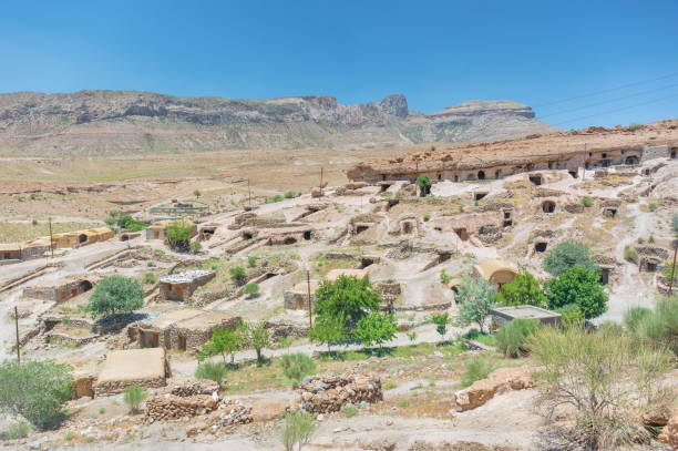 istock Cave village in the desert. cloudy sky 1464685980