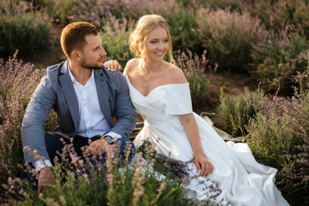 istock bride and groom on in the lavender field 1464686318