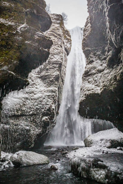 istock Vertical shot of the Gljufrabui  waterfall in Iceland 1464686391