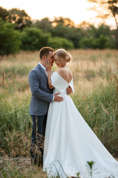 istock bride and groom on in the woods 1464688164