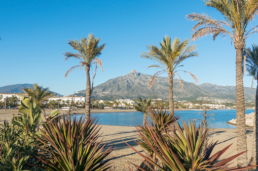 A beautiful Puerto Banus beach with La Concha Mountain background in Spain