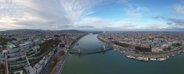 istock Panoramic shot of the Budapest skyline with  Szechenyi Chain Bridge over Danube river 1464689189