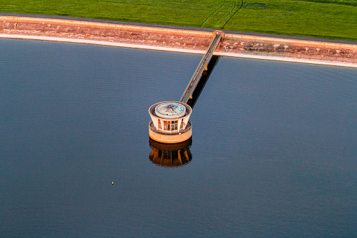 An aerial shot of the Grafham Water Reservoir in England during daylight