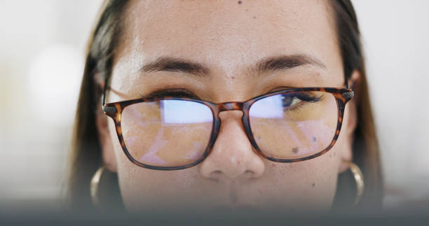 istock Computer, research and woman with glasses working on a science innovation project in a lab. Vision, online and female scientist planning a scientific biology analysis report on a pc in a laboratory. 1464691498