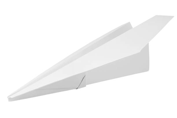 paper plane on white Toy paper plane on white background gliding photos stock pictures, royalty-free photos & images