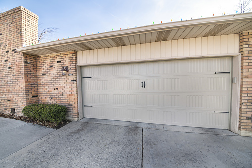 A beautiful shot of a gray garage sectional doors