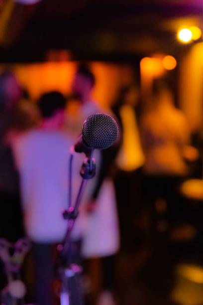 istock Selective of a microphone in a club 1464697326