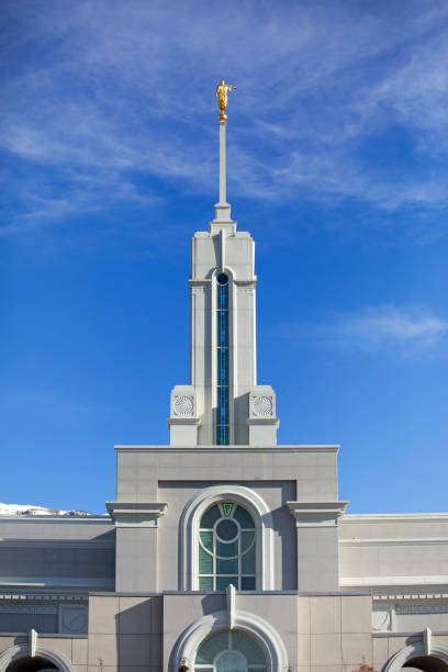 istock Vertical shot of a Mormon temple under a blue sky 1464697425