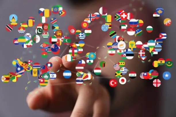 Photo of Digital concept of Global communication, floating national flags of the world