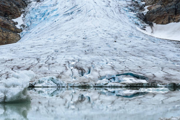 istock Ice front and glacial lake of norwegian glacier Steindalsbreen 1464703242