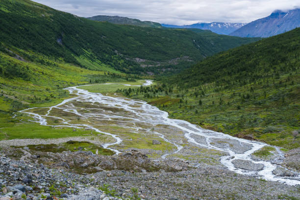 istock River system of norwegian glacier Steindalsbreen meanders in a green valley 1464703266