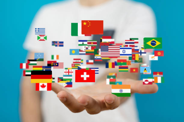 istock Person presenting the 3D render of various national flags - global communication concept 1464703968