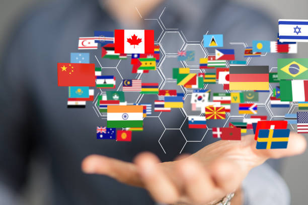 istock Person presenting the 3D render of various national flags - global communication concept 1464703969