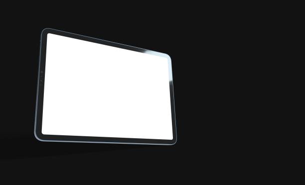 istock 3D rendering of a tablet with a luminous white screen on an isolated black background 1464703979