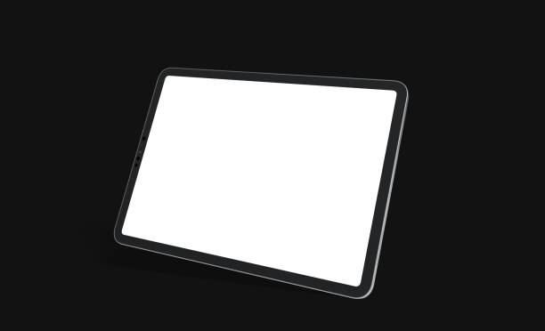 istock Closeup of a tablet with an empty screen isolated on a dark background 1464704075