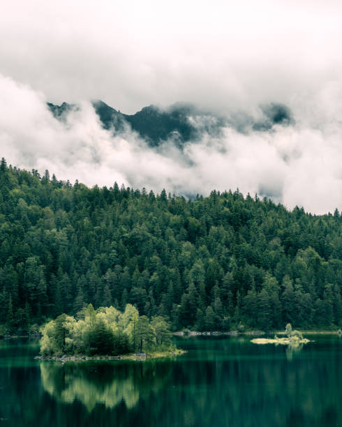istock Lake Eibsee in Bavaria with clouds and mountain peaks 1464705057