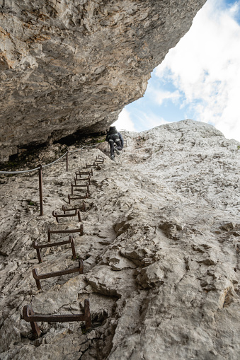 Via ferrata, a ladder leads steeply up the rock. Stopselzieher to Zugspitze mountain.