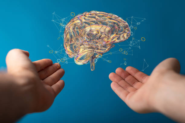 istock 3D rendering of a floating human brain above hands 1464705112
