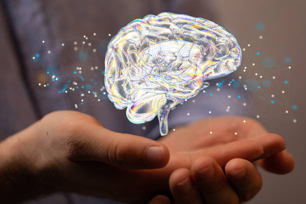 istock 3D rendering of a floating human brain above hands 1464705114