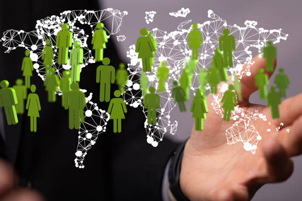 istock 3d rendering of human figures on the world map hovering over man's palm 1464705647