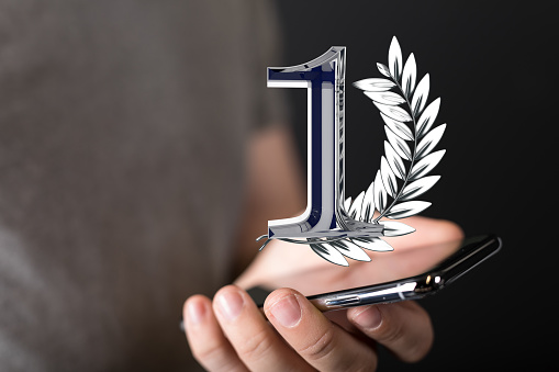 An illustration of award years anniversary symbol in a hand