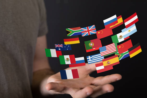 istock Person presenting a 3D render of national flags of different countries 1464706600
