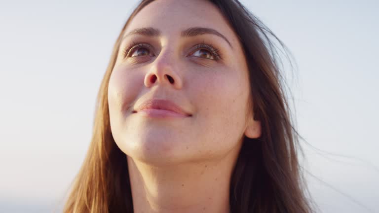 Nature, thinking and freedom face of woman enjoying peace on summer sun walk break in Brazil zoom. Happy, relax and calm girl thoughtful in sunshine with hopeful, natural and beautiful smile.