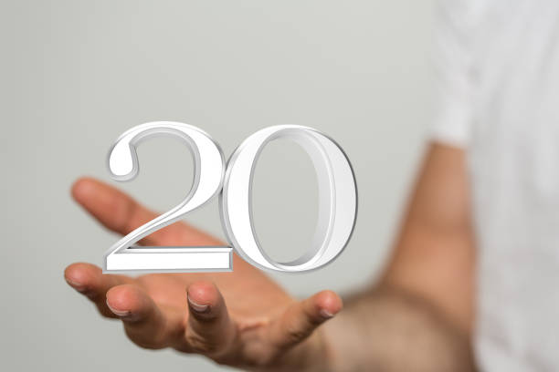 istock Person presenting a 3D render of 20 years anniversary celebration logotype 1464707070