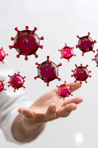 istock Illustration of digital Covid-19 cells 1464707235