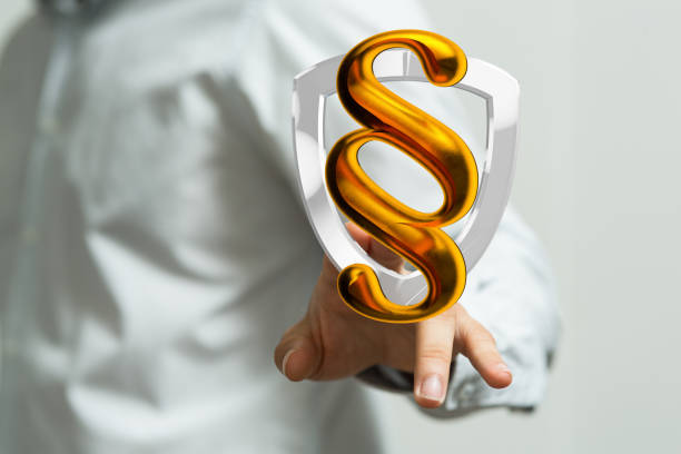 istock Person presenting a 3D render of paragraph law signs 1464707266