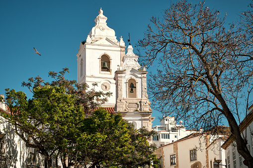 A bell and clock towers of a church in Lagos, Algarve, Portugal