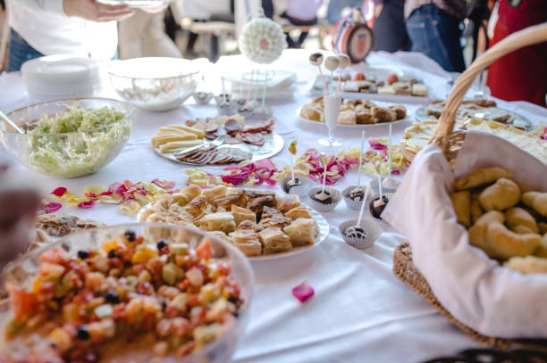 istock Snacks, canapes, and salads at the wedding catering 1464708748