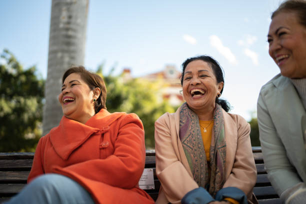 istock Senior friends talking outdoors 1464709162