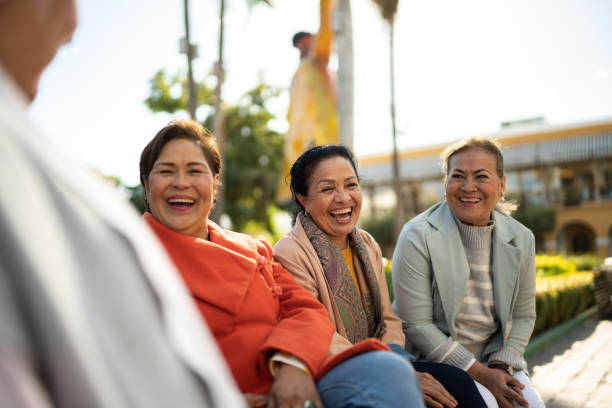 istock Senior friends talking outdoors 1464709169