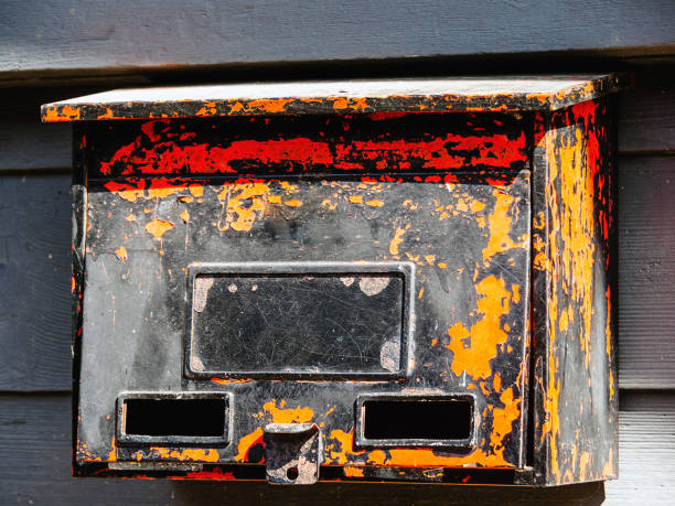 istock Closeup of an old weathered rusty Japanese metallic mailbox 1464709205