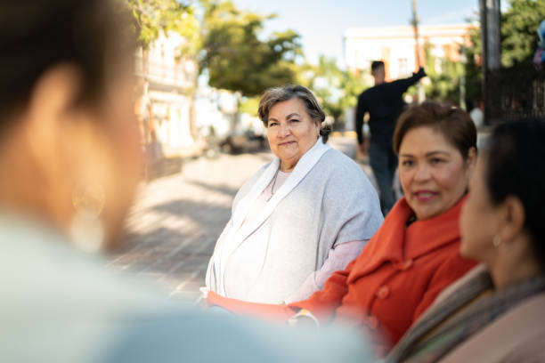istock Senior friends talking outdoors 1464709255